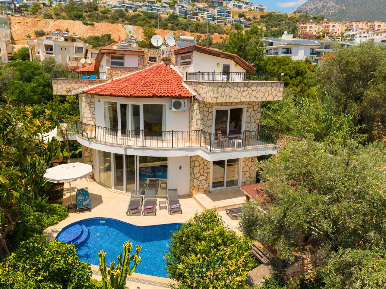 Villa Hannah Kalkan exterior view with walled gardens and private pool